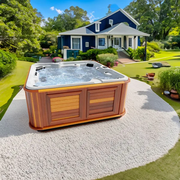 Arctic Spas McKinley hot tub with corner lounger on a covered deck