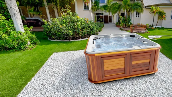 Arctic Spas McKinley installed beside an outdoor lounge area
