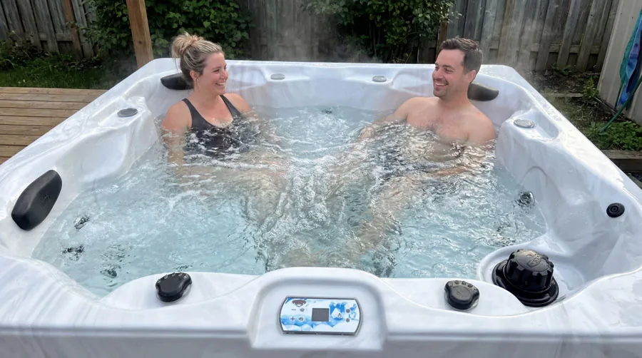 Arctic Spas Nova spa with clean cabinet lines in a modern garden